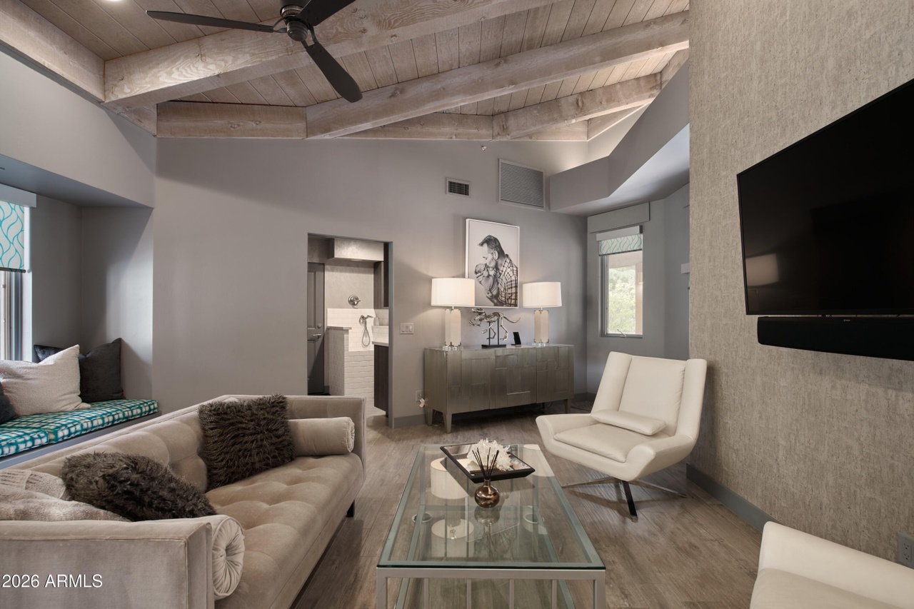 Guest bedroom with beamed ceiling